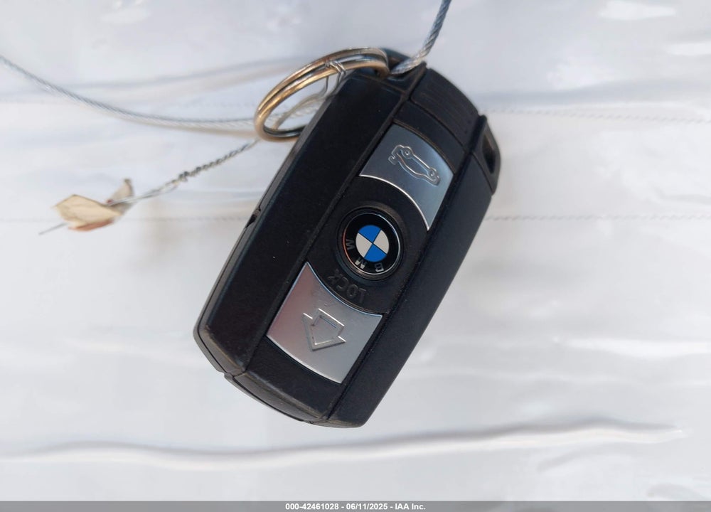 2009 BMW 128I VIN: WBAUL73579VJ77120