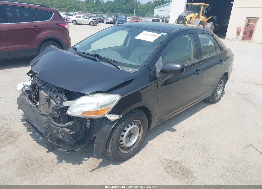 2009 TOYOTA YARIS VIN: JTDBT903091299706