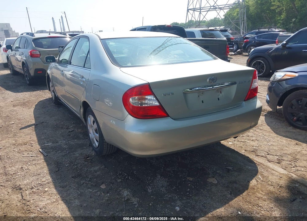 2002 TOYOTA CAMRY LE VIN: JTDBE32K520115478