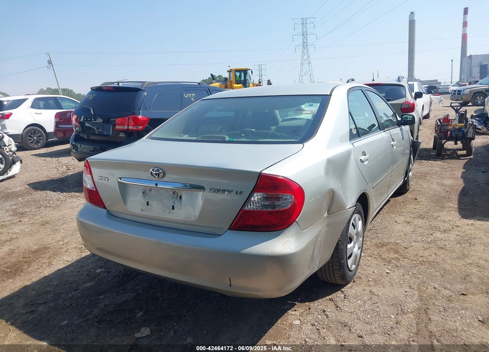 2002 TOYOTA CAMRY LE VIN: JTDBE32K520115478