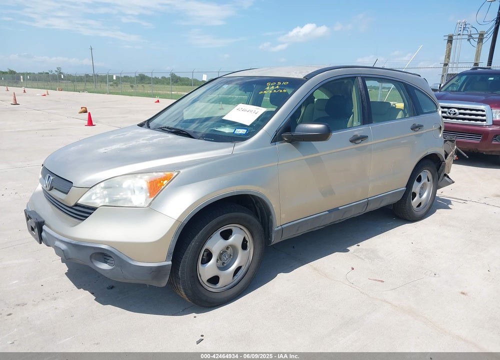 2009 HONDA CR-V LX VIN: JHLRE38399C005429
