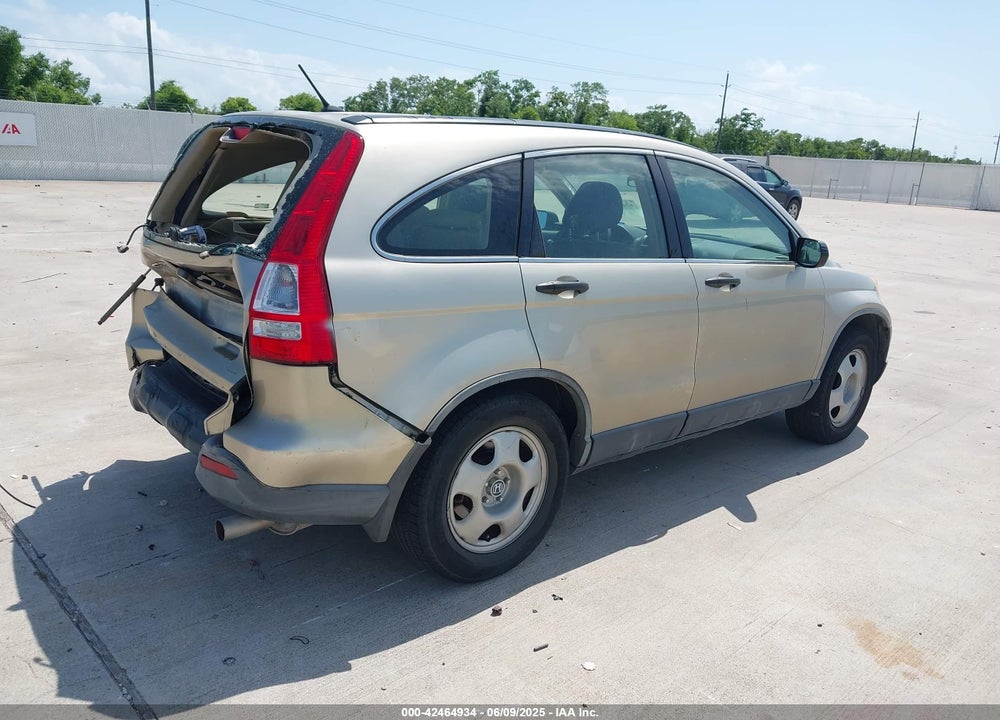 2009 HONDA CR-V LX VIN: JHLRE38399C005429