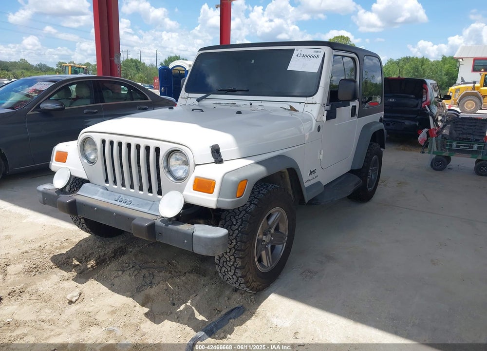 2004 JEEP WRANGLER SPORT RHD VIN: 1J4F449S14P717668