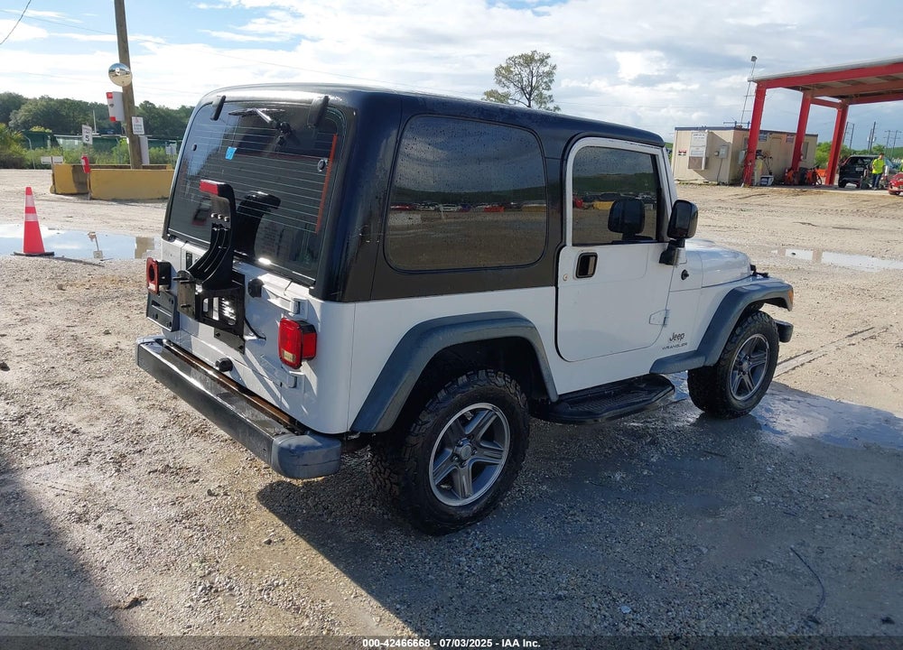 2004 JEEP WRANGLER SPORT RHD VIN: 1J4F449S14P717668