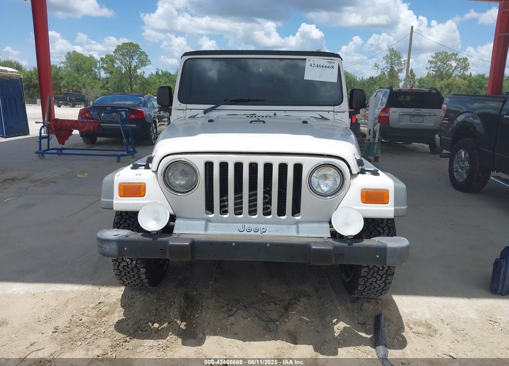 2004 JEEP WRANGLER SPORT RHD VIN: 1J4F449S14P717668