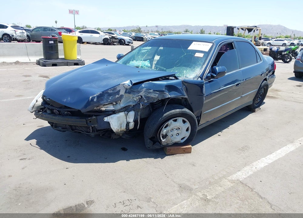 2000 HONDA ACCORD 2.3 LX VIN: JHMCG5647YC018312