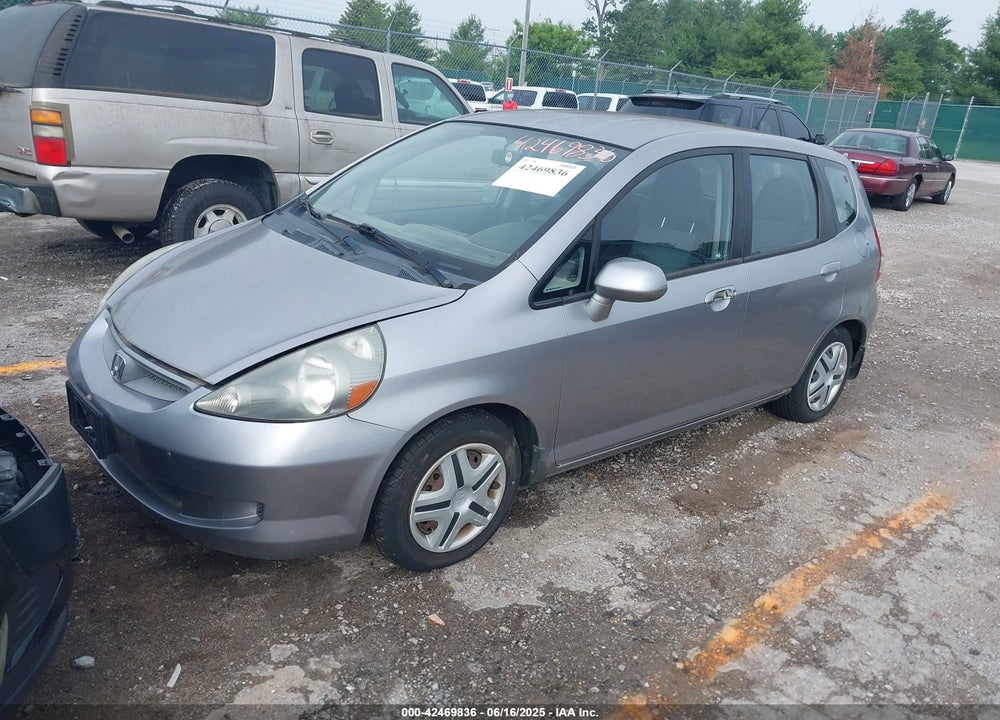 2007 HONDA FIT VIN: JHMGD38437S017433