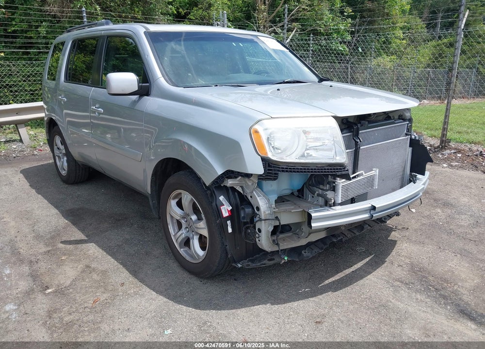 2012 HONDA PILOT EX-L VIN: 5FNYF4H57CB028070