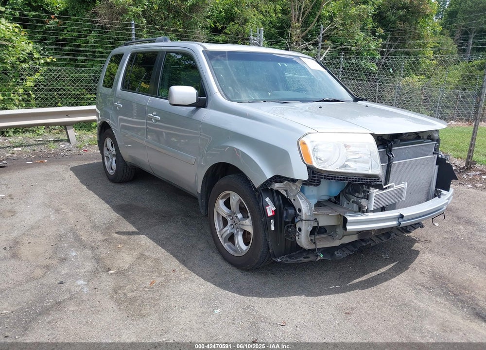 2012 HONDA PILOT EX-L VIN: 5FNYF4H57CB028070