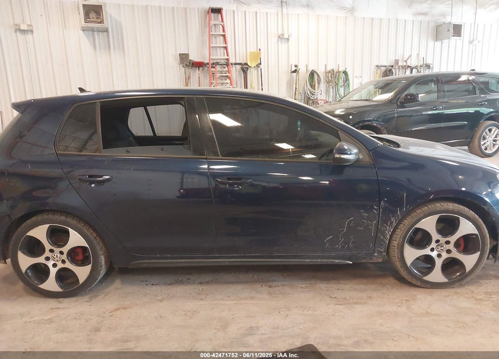 2011 VOLKSWAGEN GTI VIN: WVWHD7AJ1BW254131
