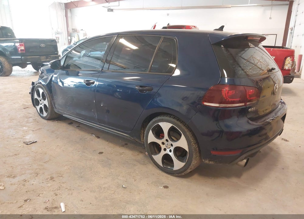 2011 VOLKSWAGEN GTI VIN: WVWHD7AJ1BW254131