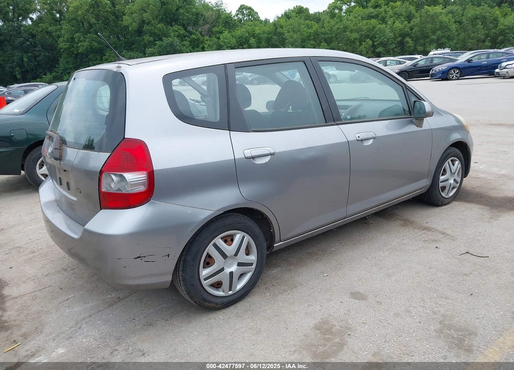 2007 HONDA FIT VIN: JHMGD374X7S004101