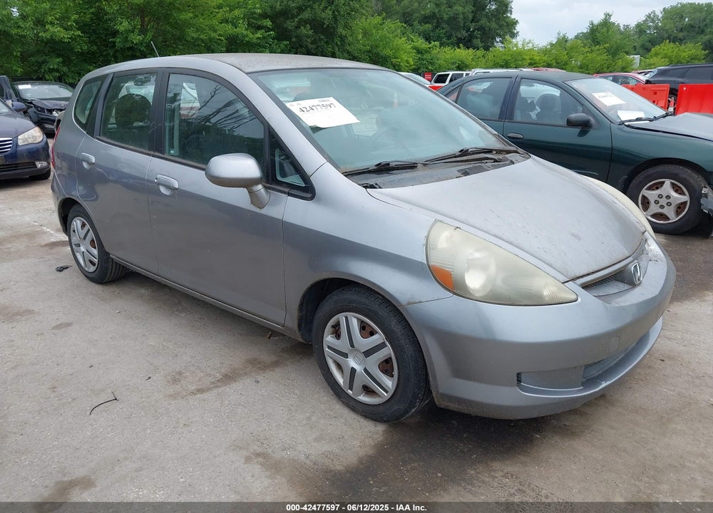 2007 HONDA FIT VIN: JHMGD374X7S004101