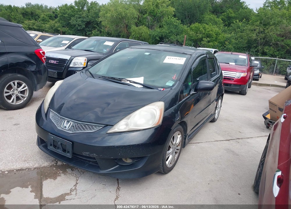 2010 HONDA FIT VIN: JHMGE8H61AC018495