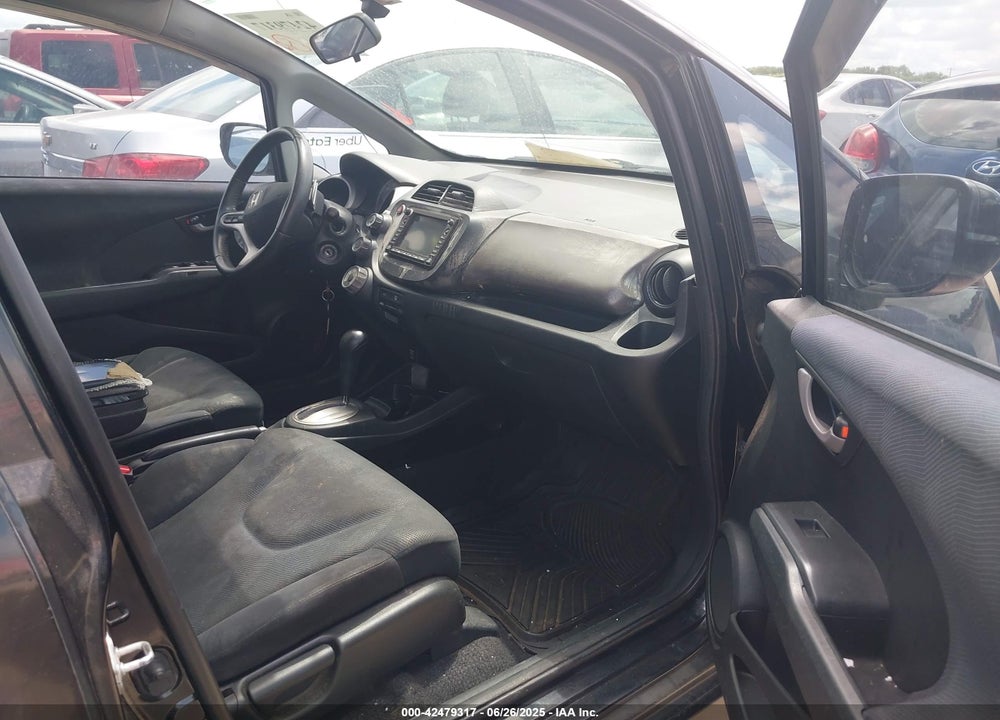 2010 HONDA FIT VIN: JHMGE8H61AC018495
