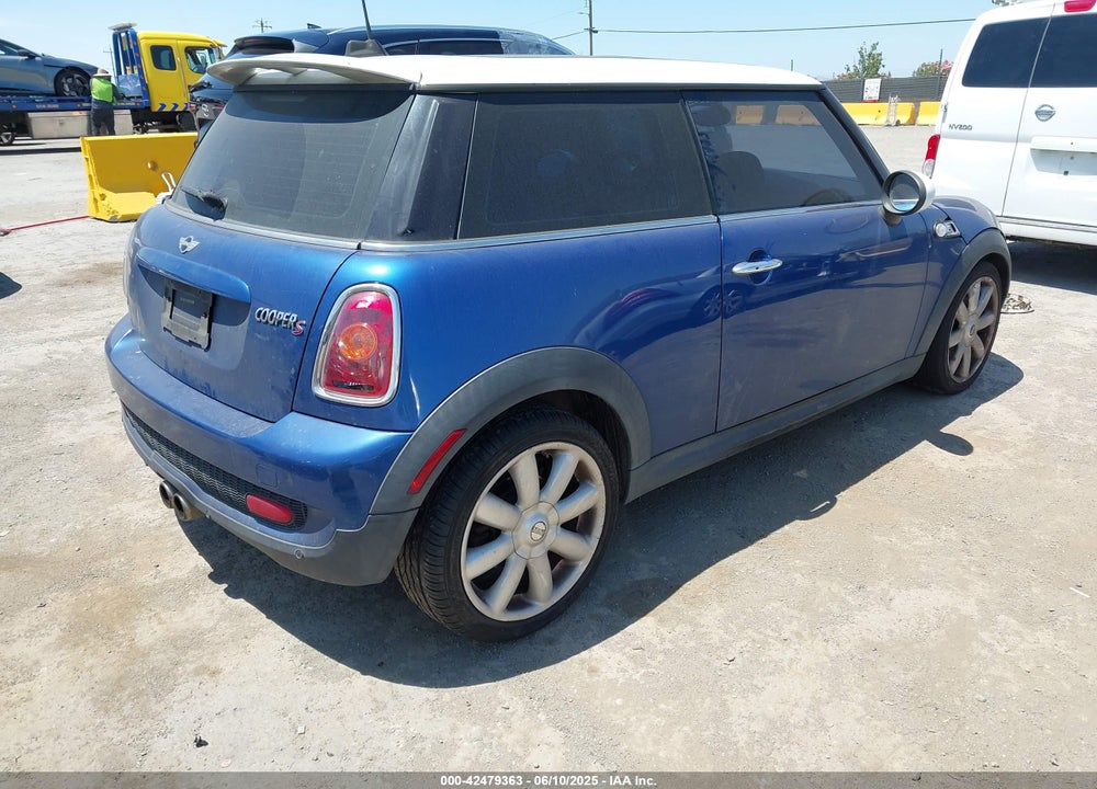 2009 MINI COOPER HARDTOP VIN: WMWMF73539TW83496