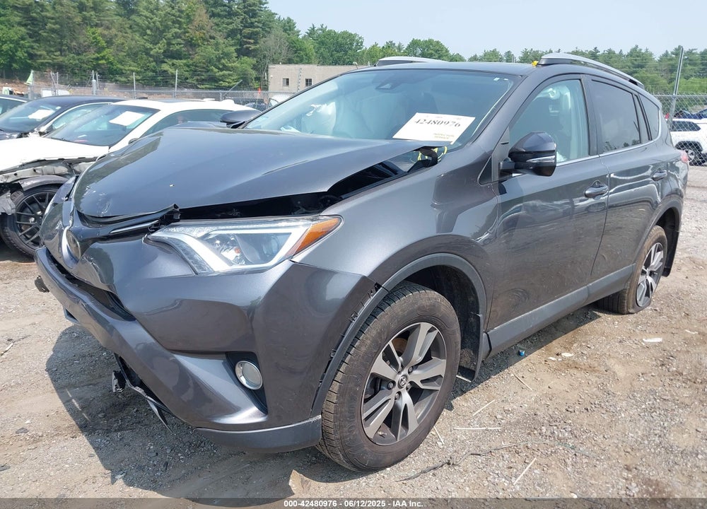 2018 TOYOTA RAV4 VIN: 2T3RFREV7JW809328