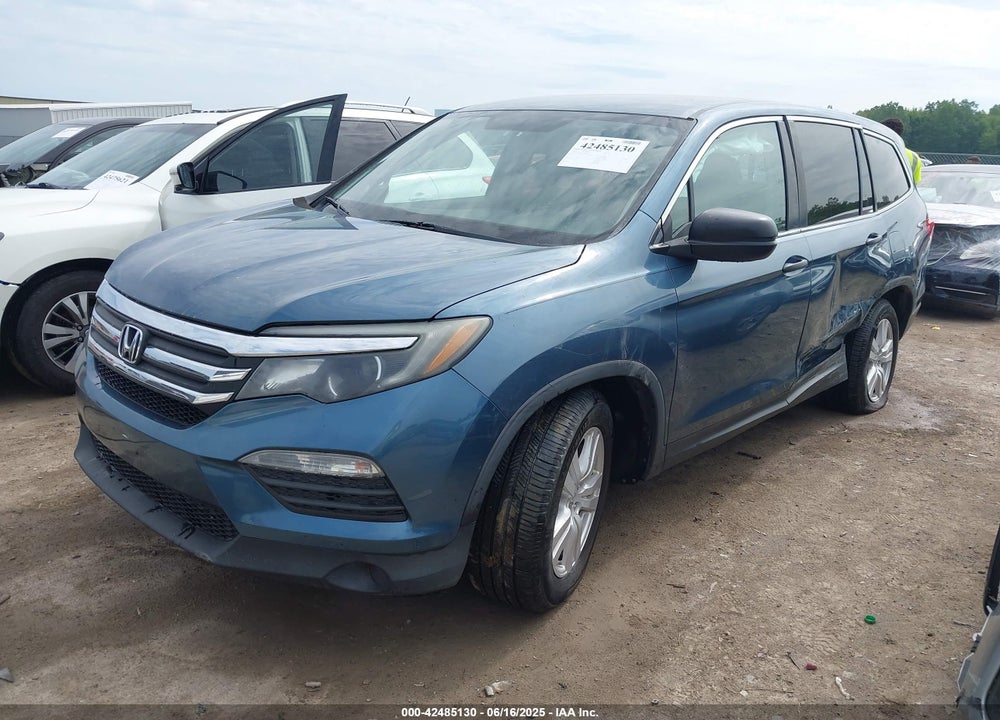 2016 HONDA PILOT VIN: 5FNYF6H10GB006409