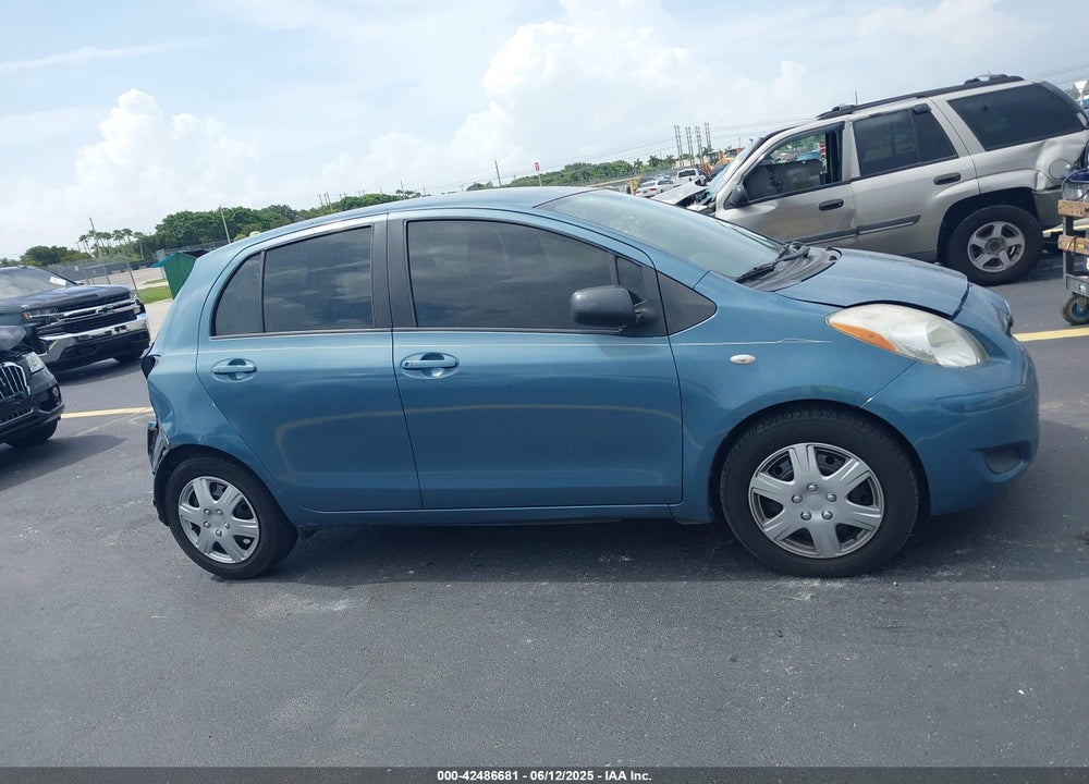 2009 TOYOTA YARIS VIN: JTDKT903595260120