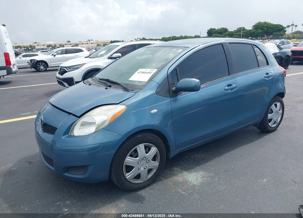 2009 TOYOTA YARIS VIN: JTDKT903595260120
