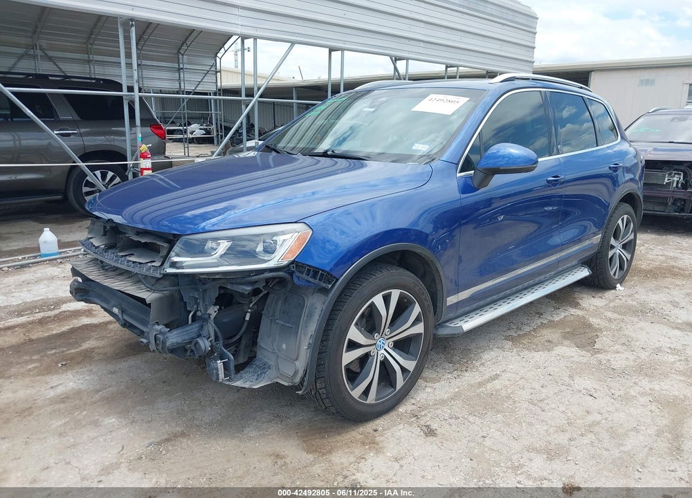 2017 VOLKSWAGEN TOUAREG VIN: WVGRF7BP7HD004054