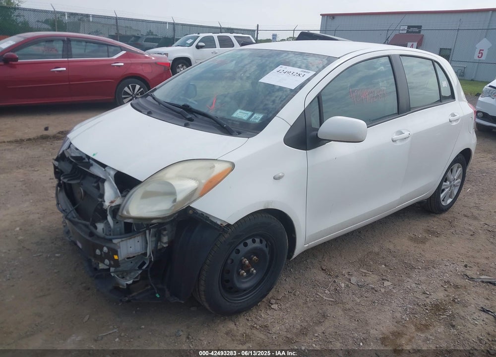 2009 TOYOTA YARIS VIN: JTDKT903595248243