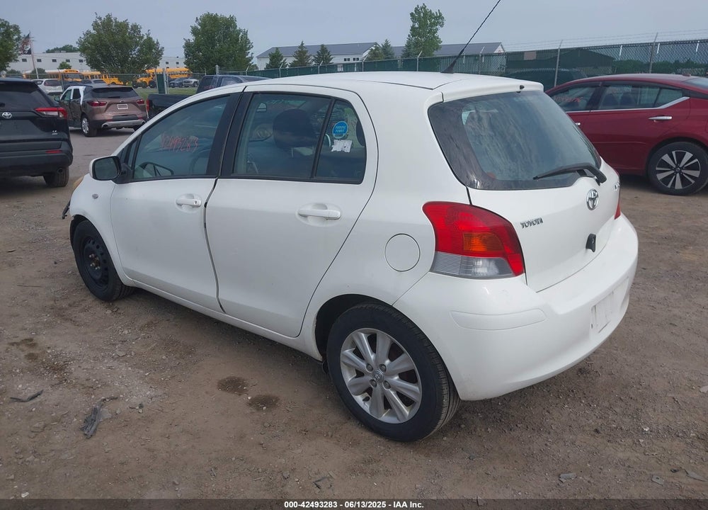 2009 TOYOTA YARIS VIN: JTDKT903595248243