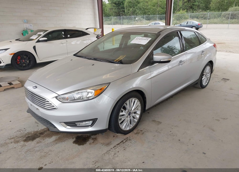 2017 FORD FOCUS TITANIUM VIN: 1FADP3J29HL329410