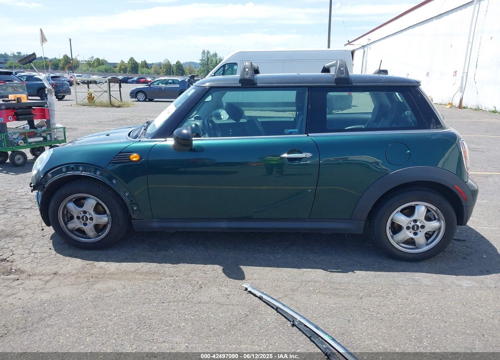 2010 MINI COOPER VIN: WMWMF3C58ATZ67297