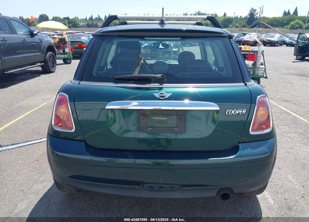 2010 MINI COOPER VIN: WMWMF3C58ATZ67297
