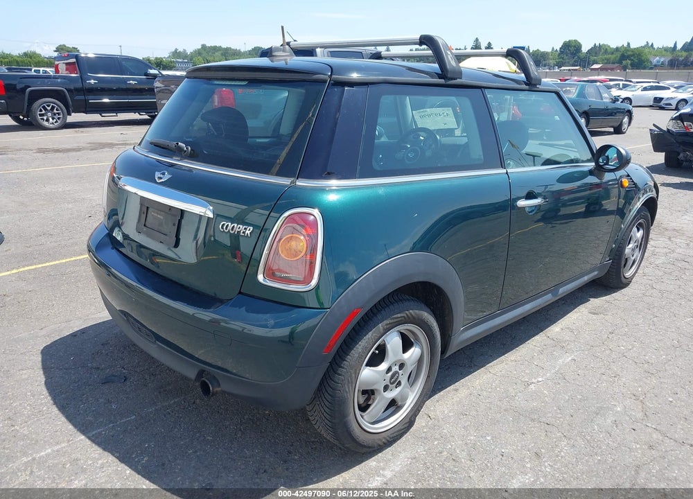 2010 MINI COOPER VIN: WMWMF3C58ATZ67297