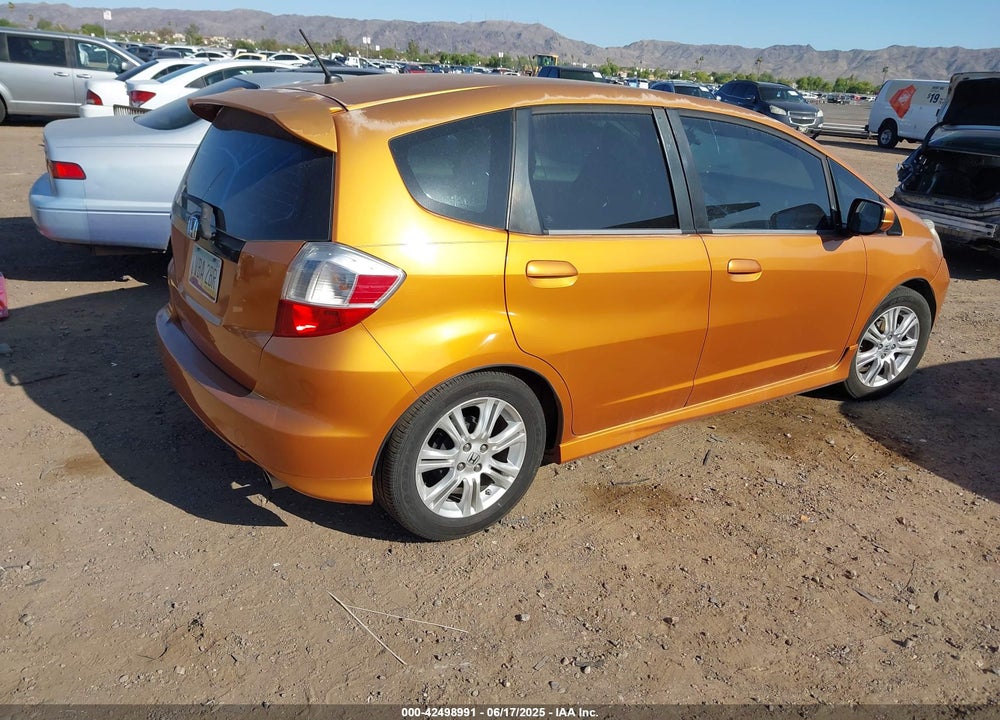 2009 HONDA FIT VIN: JHMGE88499S075267