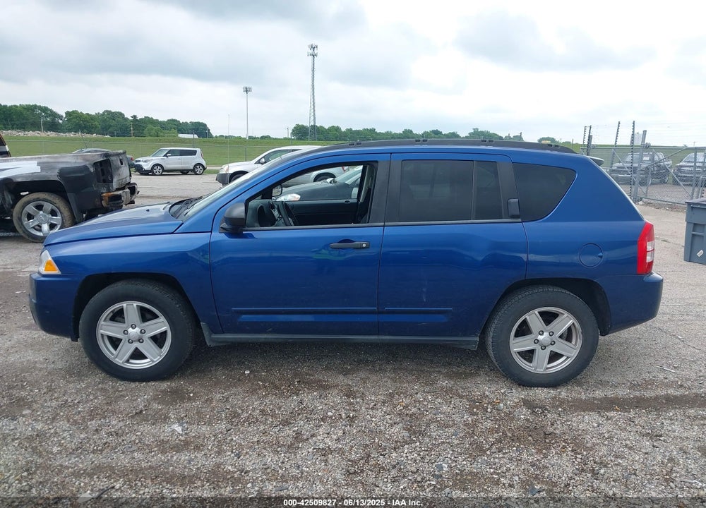 2009 JEEP COMPASS VIN: 1J4FF47B49D138230