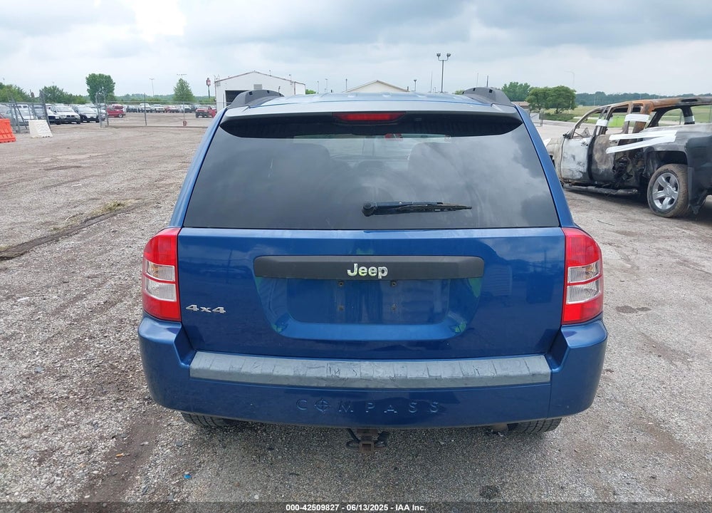 2009 JEEP COMPASS VIN: 1J4FF47B49D138230