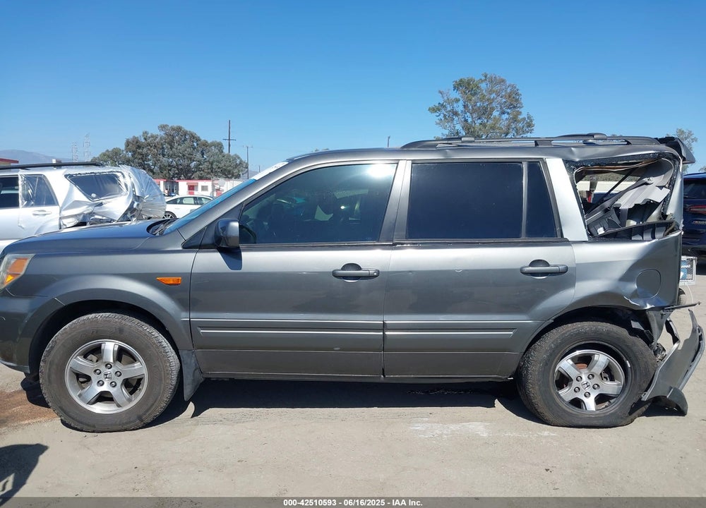 2007 HONDA PILOT VIN: 2HKYF18577H500497