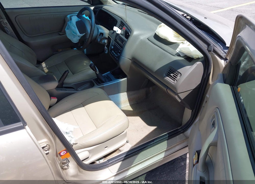 1999 INFINITI G20 VIN: JNKCP11A8XT013575