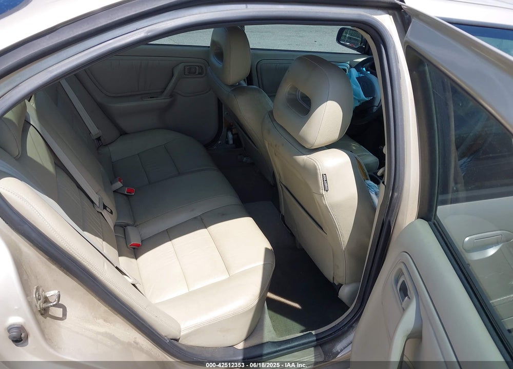 1999 INFINITI G20 VIN: JNKCP11A8XT013575