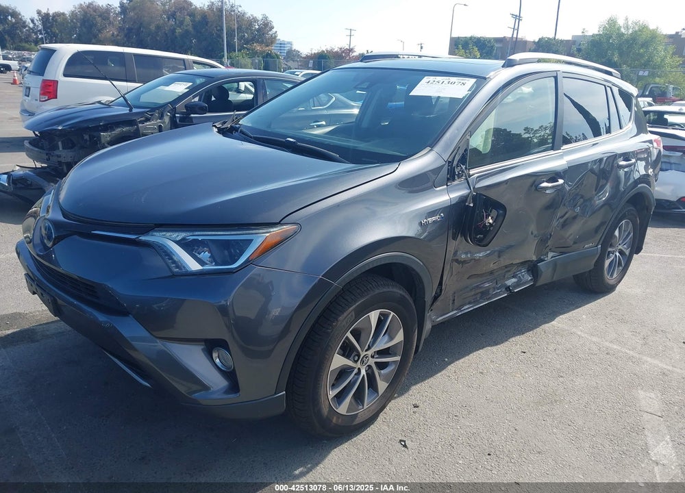 2018 TOYOTA RAV4 HYBRID XLE VIN: JTMRJREV5JD240054