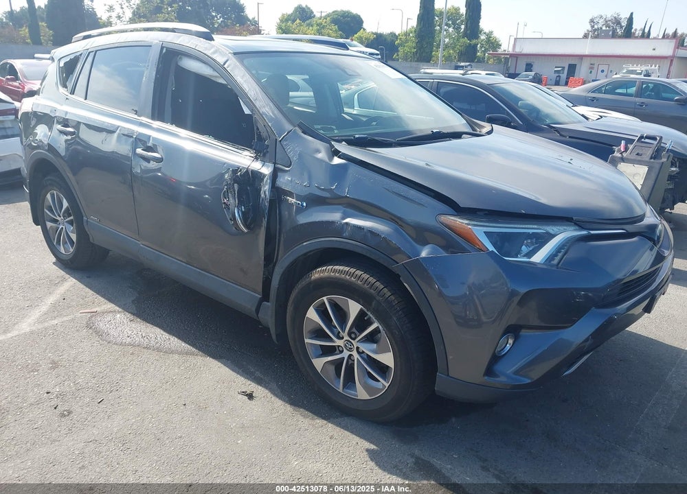 2018 TOYOTA RAV4 HYBRID XLE VIN: JTMRJREV5JD240054