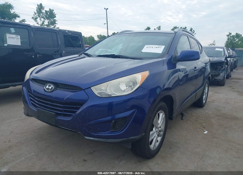 2010 HYUNDAI TUCSON VIN: KM8JUCAC3AU021482