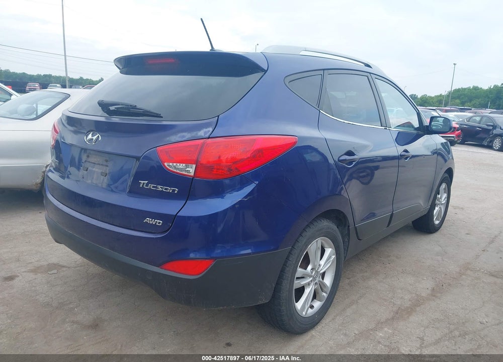 2010 HYUNDAI TUCSON VIN: KM8JUCAC3AU021482