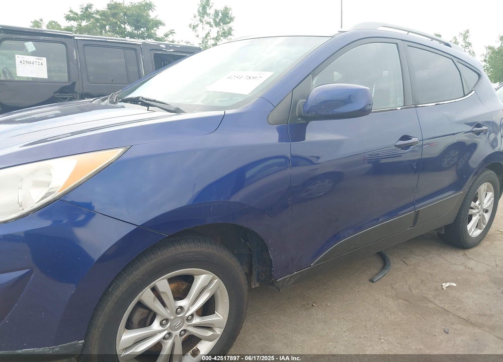 2010 HYUNDAI TUCSON VIN: KM8JUCAC3AU021482