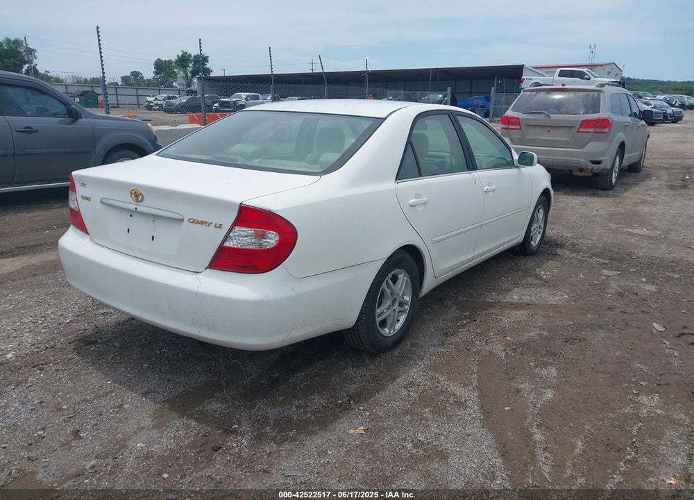 2003 TOYOTA CAMRY LE VIN: JTDBE32K130167451