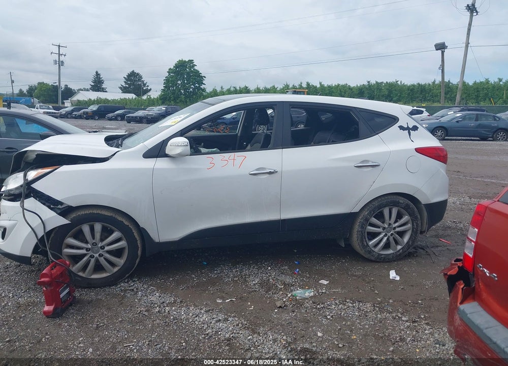 2013 HYUNDAI TUCSON VIN: KM8JUCAC9DU774373