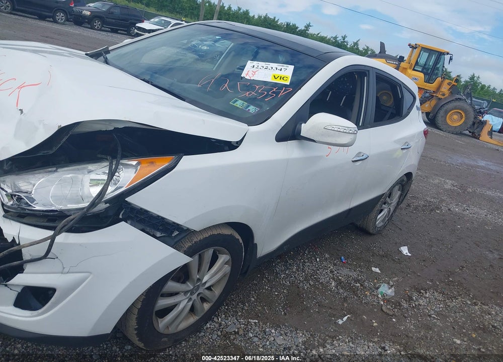 2013 HYUNDAI TUCSON VIN: KM8JUCAC9DU774373