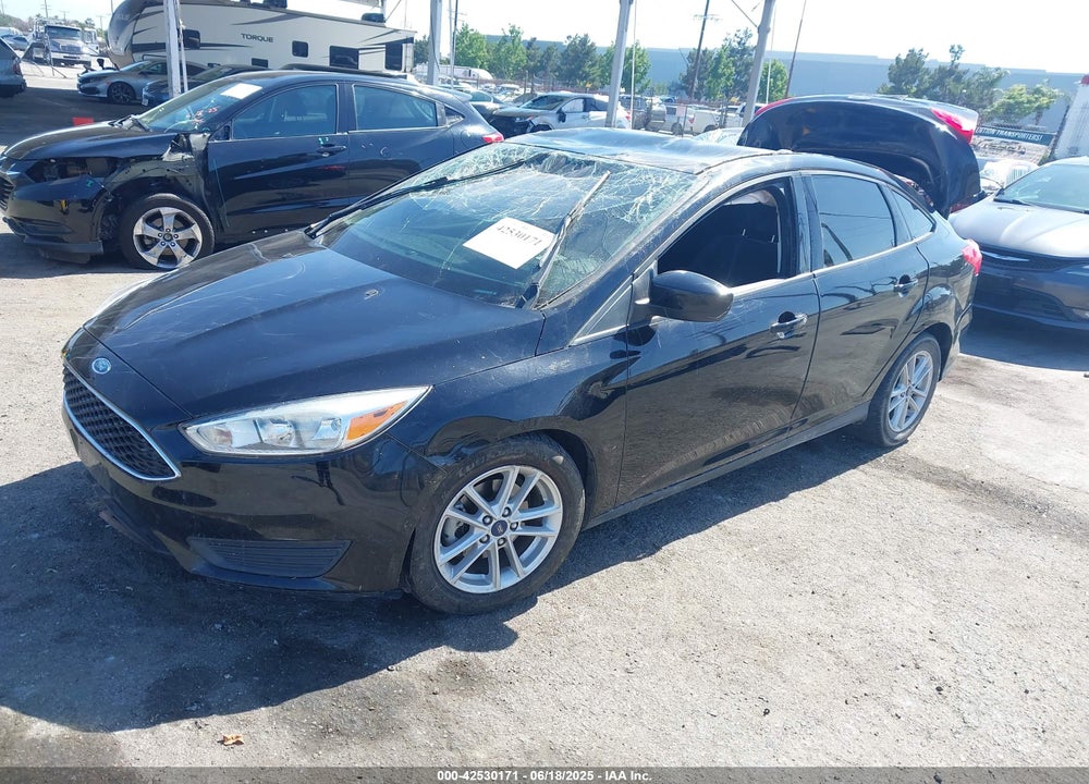 2018 FORD FOCUS VIN: 1FADP3FE9JL303933