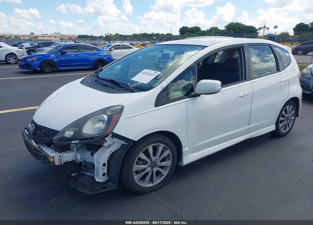 2013 HONDA FIT SPORT VIN: JHMGE8H59DC077693