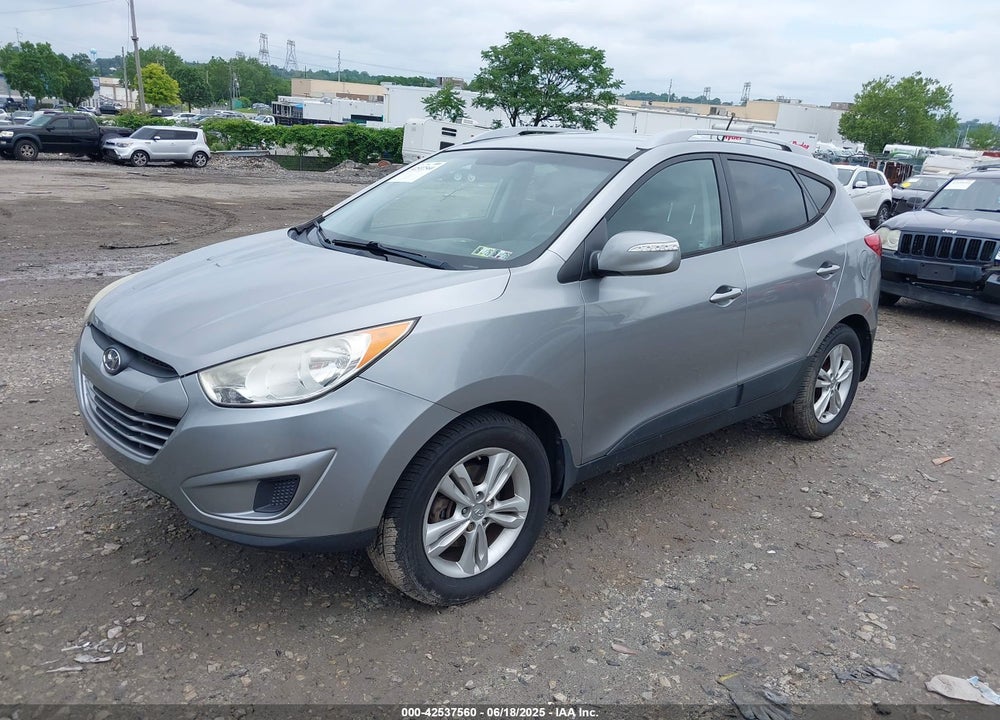 2012 HYUNDAI TUCSON VIN: KM8JUCAC2CU500429