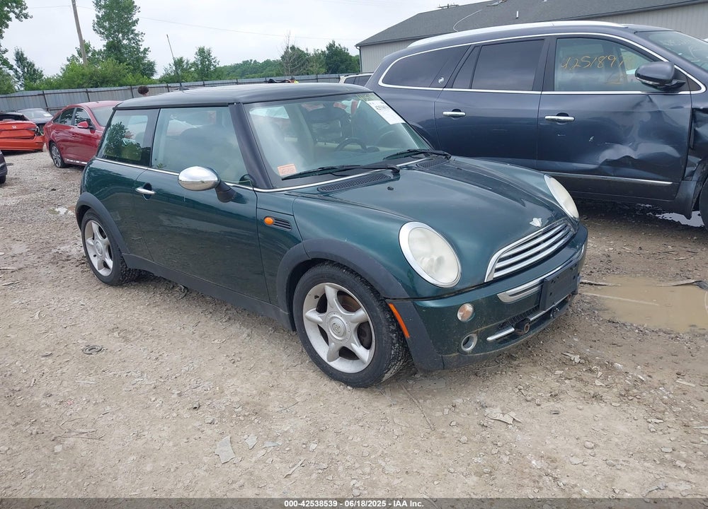 2006 MINI COOPER VIN: WMWRC33566TK67977