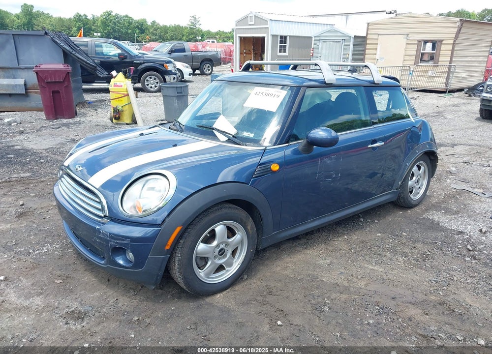 2009 MINI COOPER VIN: WMWMF33509TU74290